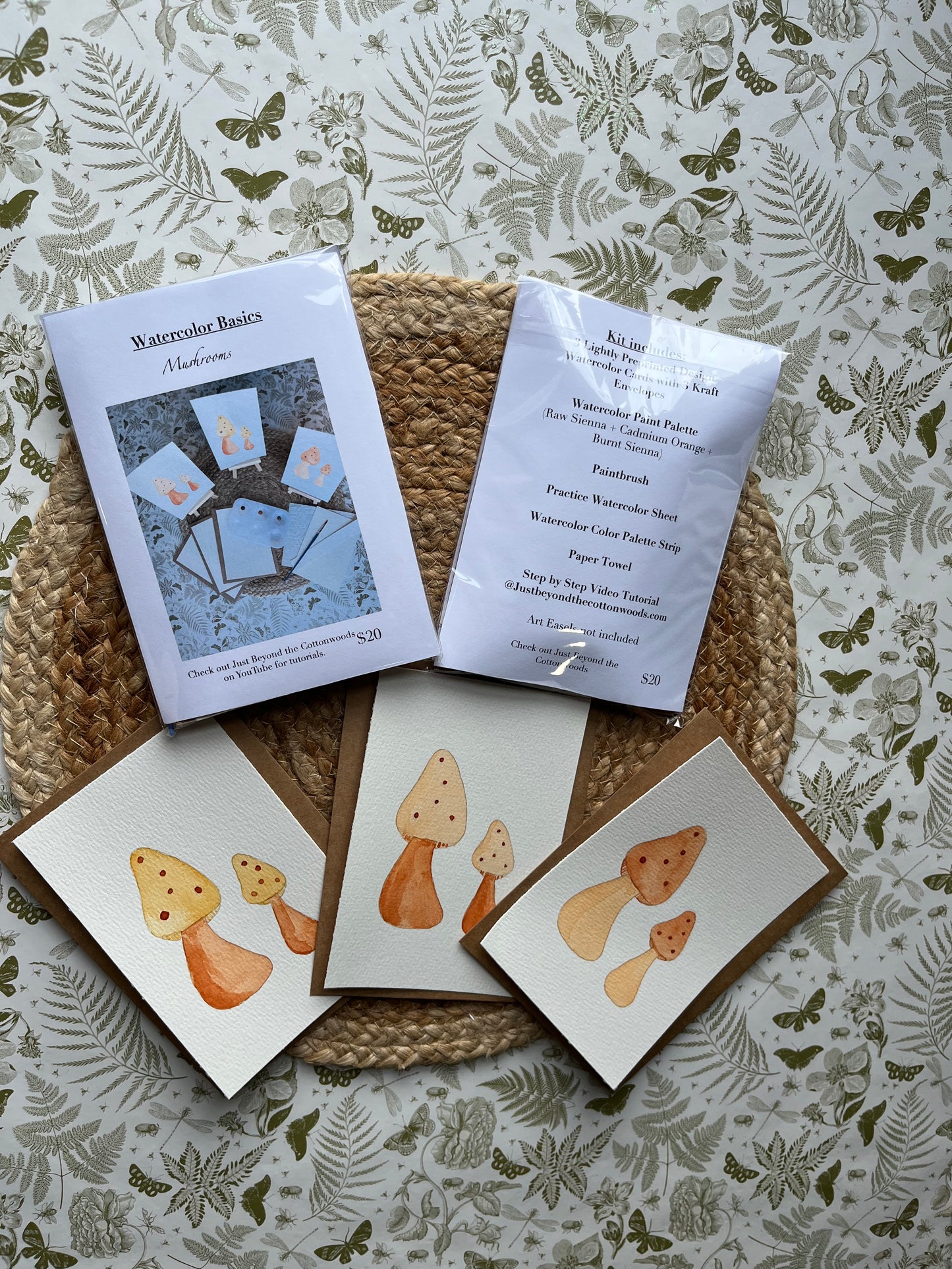 Set of greeting cards with mushroom watercolor paintings on a textured surface