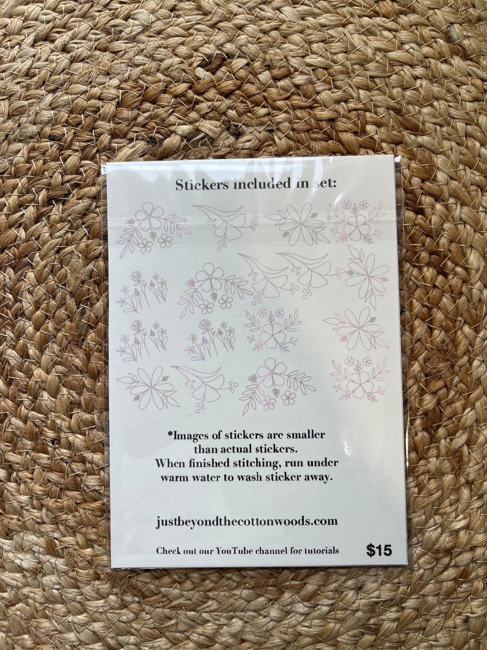 Floral sticker patterns on woven background